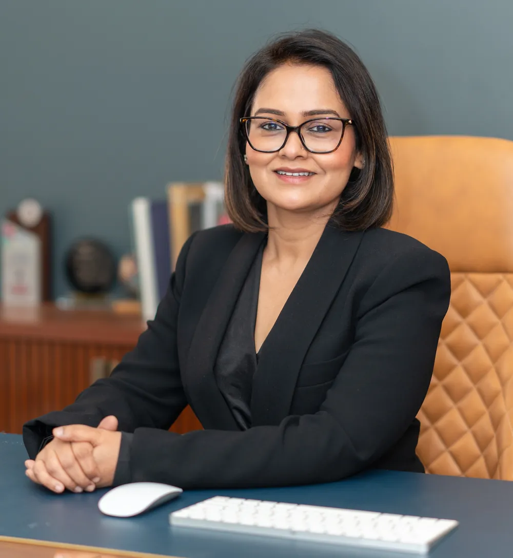 Dr Pragati Shubha, Founder and Director of RIAMS, seated at her desk in her office